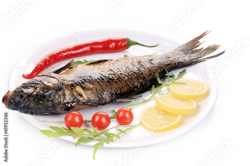 Fried fish on a white plate