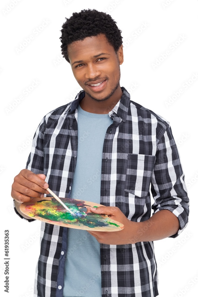 Portrait of a young male painter with palette Portrait of a young male painter with palette