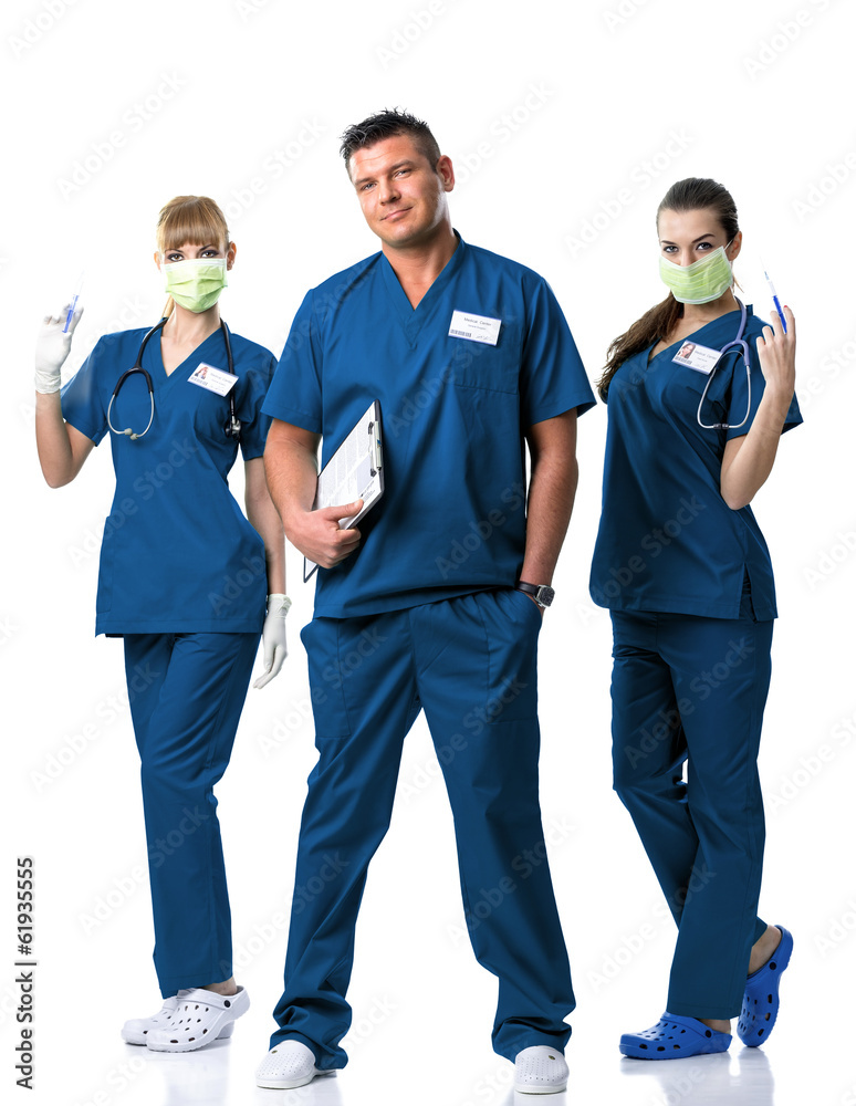 Surgery Team -Doctor, two nurses in blue dress Surgery Team -Doctor, two nurses in blue dress