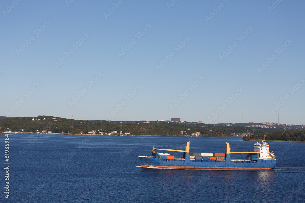 Partially Full Freighter in Calm Blue Sea