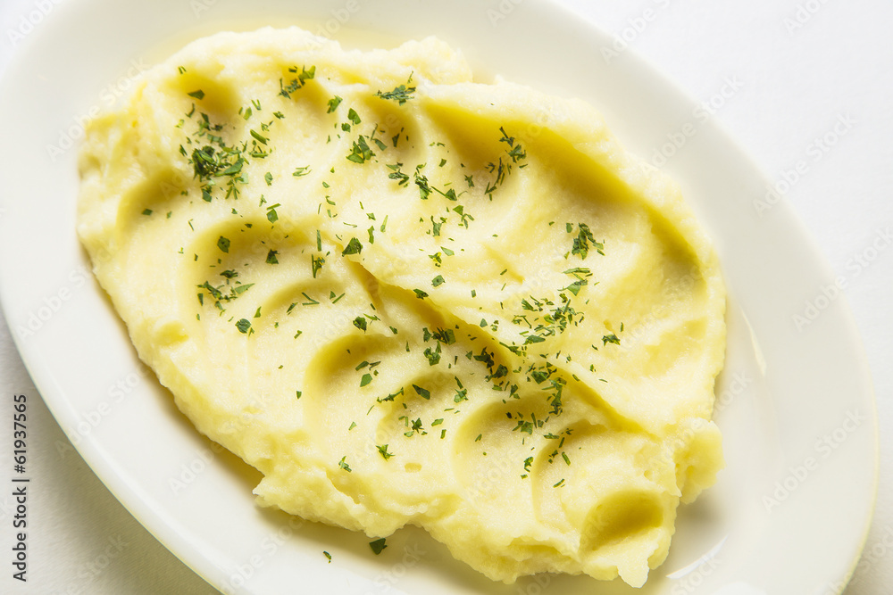 mashed potatoes on a white plate mashed potatoes on a white plate