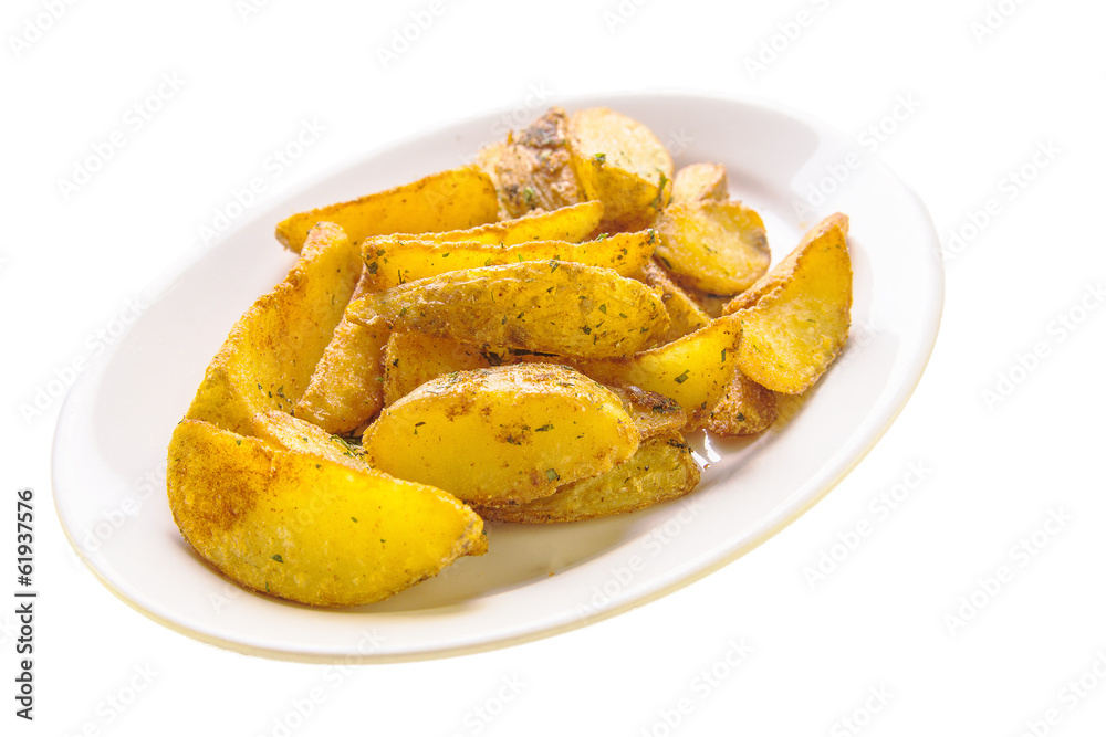 roasted potato wedges on a white plate roasted potato wedges on a white plate