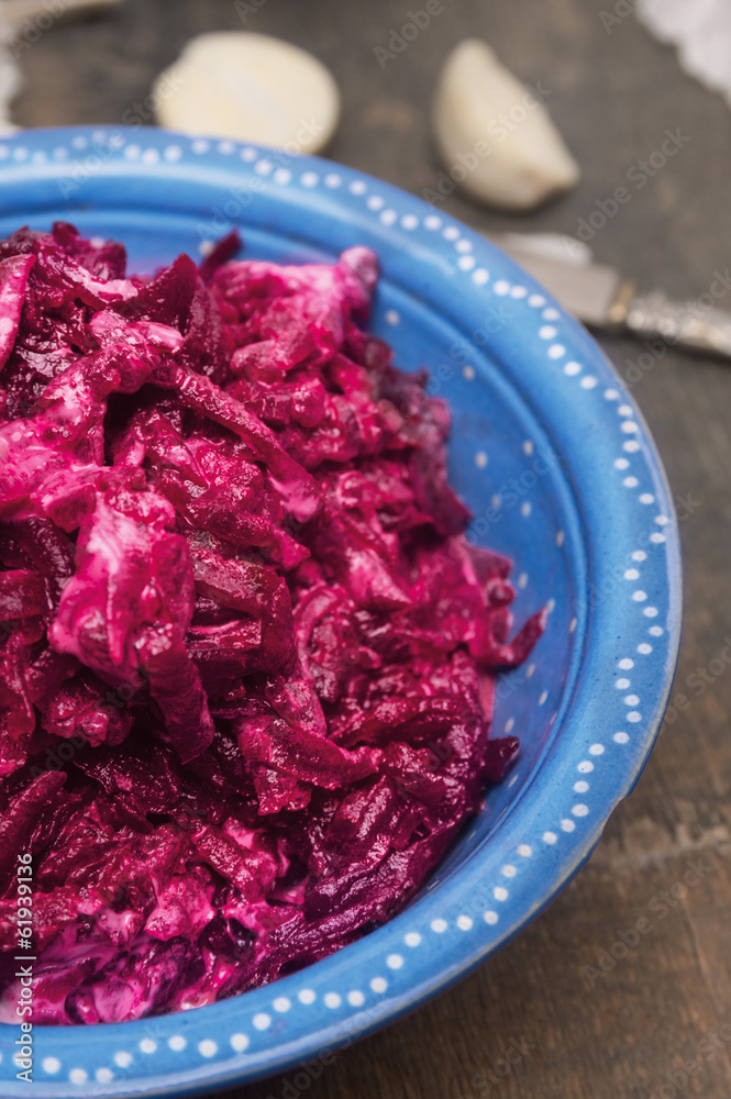 rustic beet salad with mayonnaise and garlic in blue bowl rustic beet salad with mayonnaise and garlic in blue bowl