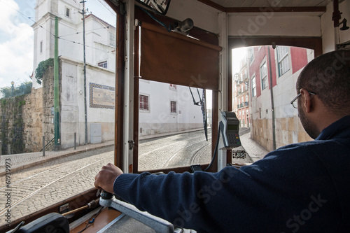 interior view of tram conductor in Lisbon, Portugal.