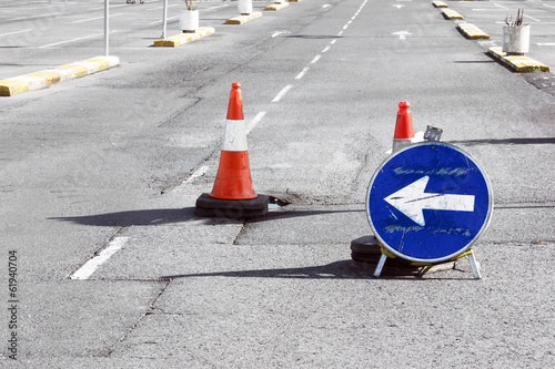 Road detour sign and cones due pothole © mimadeo