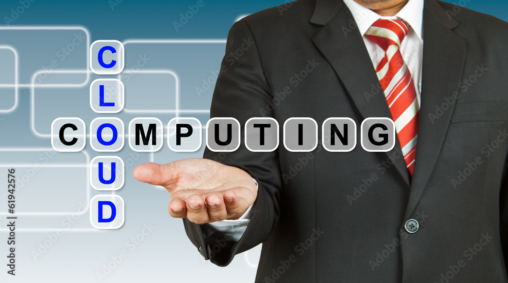 Businessman with wording Cloud Computing Businessman with wording Cloud Computing