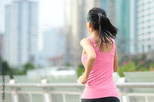 healthy lifestyle woman running at city