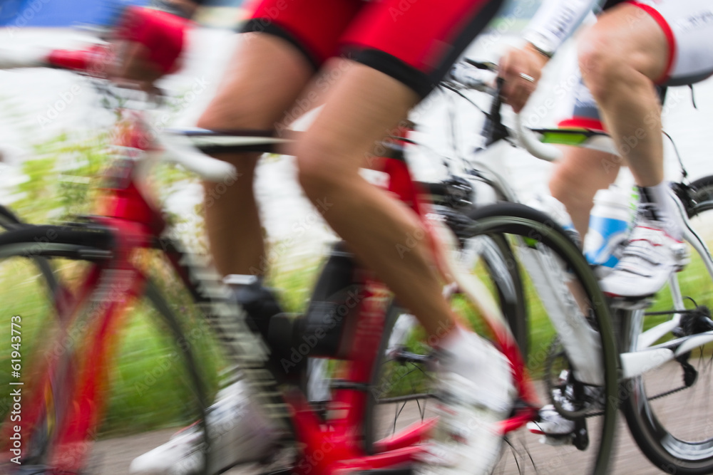 Fototapeta premium Racing cyclists at high speed