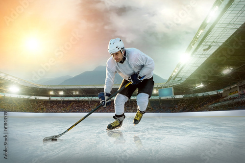 Photography Ice hockey player on the ice. Open stadium - Winter Classic game