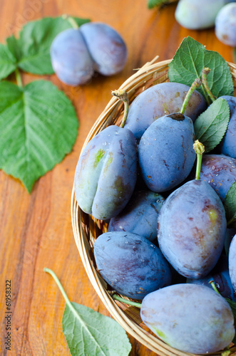 Fresh prunes in a basket