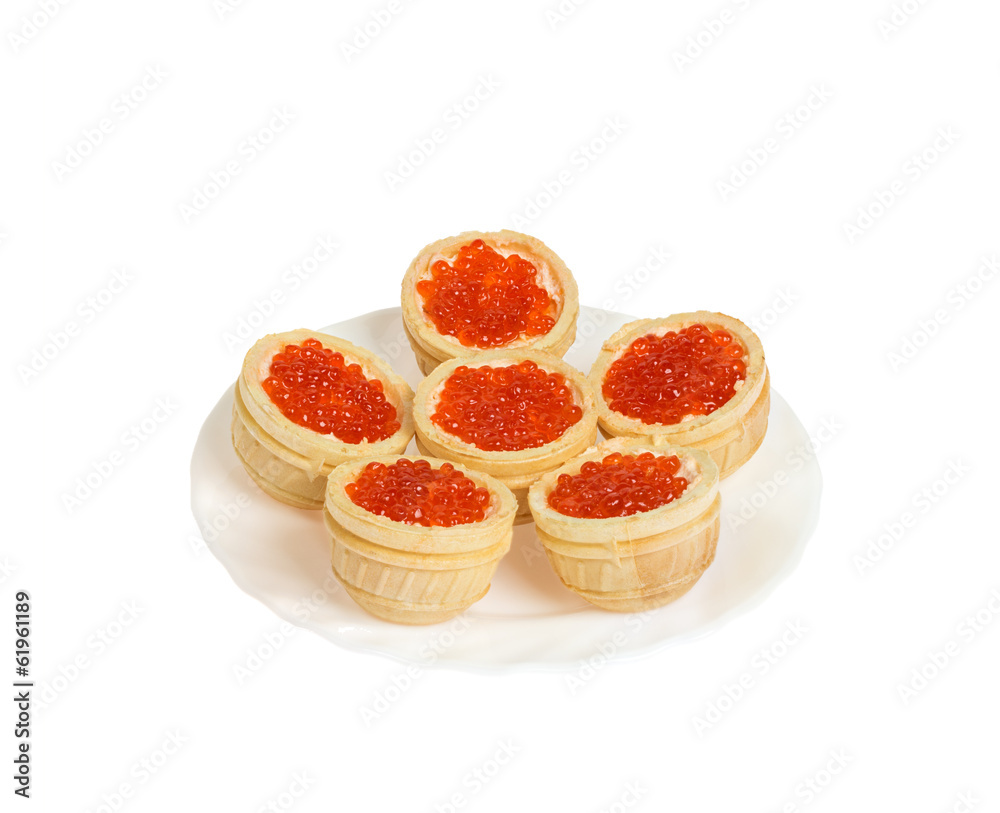 Red caviar in tartlets. Isolated Red caviar in tartlets. Isolated