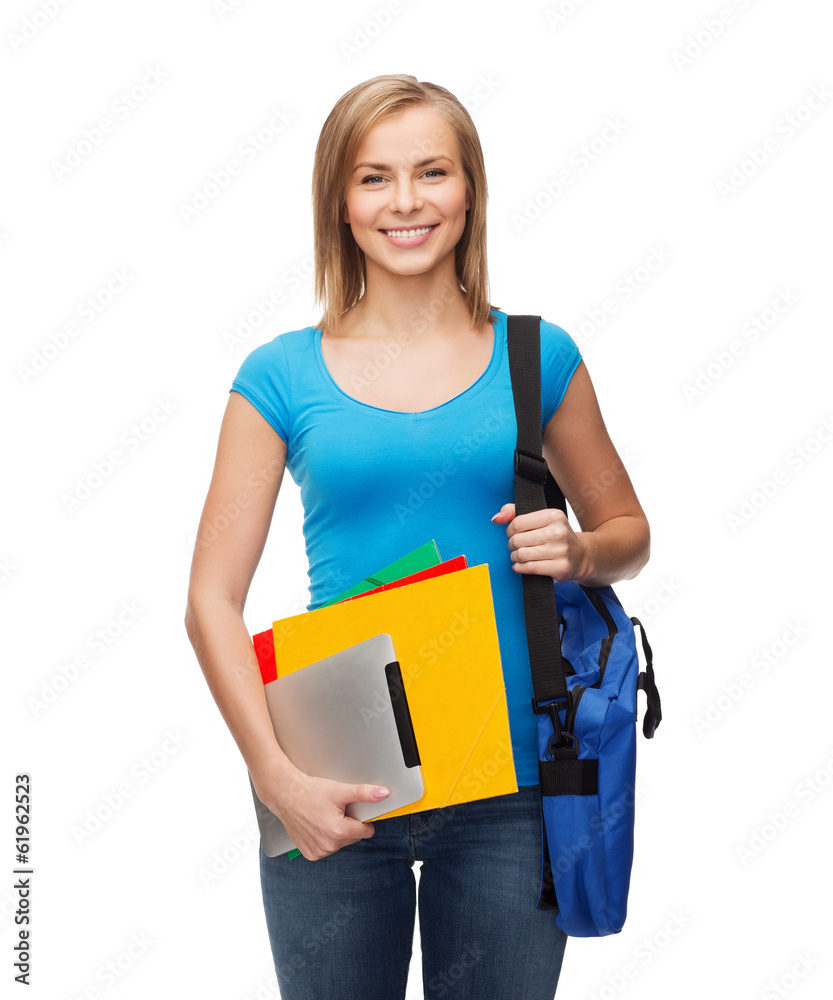 smiling student with bag, folders and tablet pc smiling student with bag, folders and tablet pc