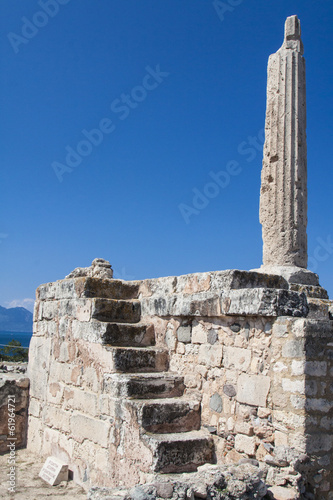 A lone pillar of the prehistoric Greek temple to Apollo
