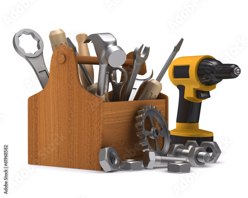 Wooden toolbox with tools. ...