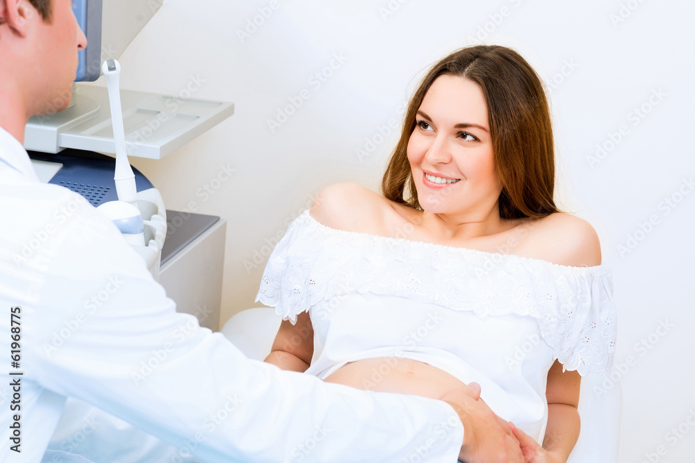 pregnant woman on reception at the doctor pregnant woman on reception at the doctor