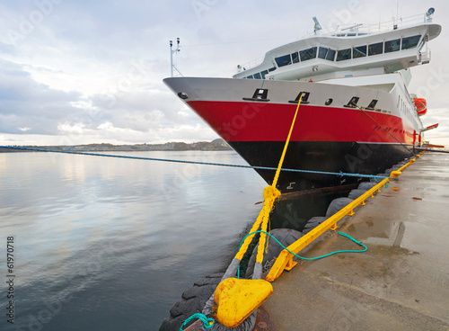 Big modern passenger cruise ship moored in Rorvik, Norway photo