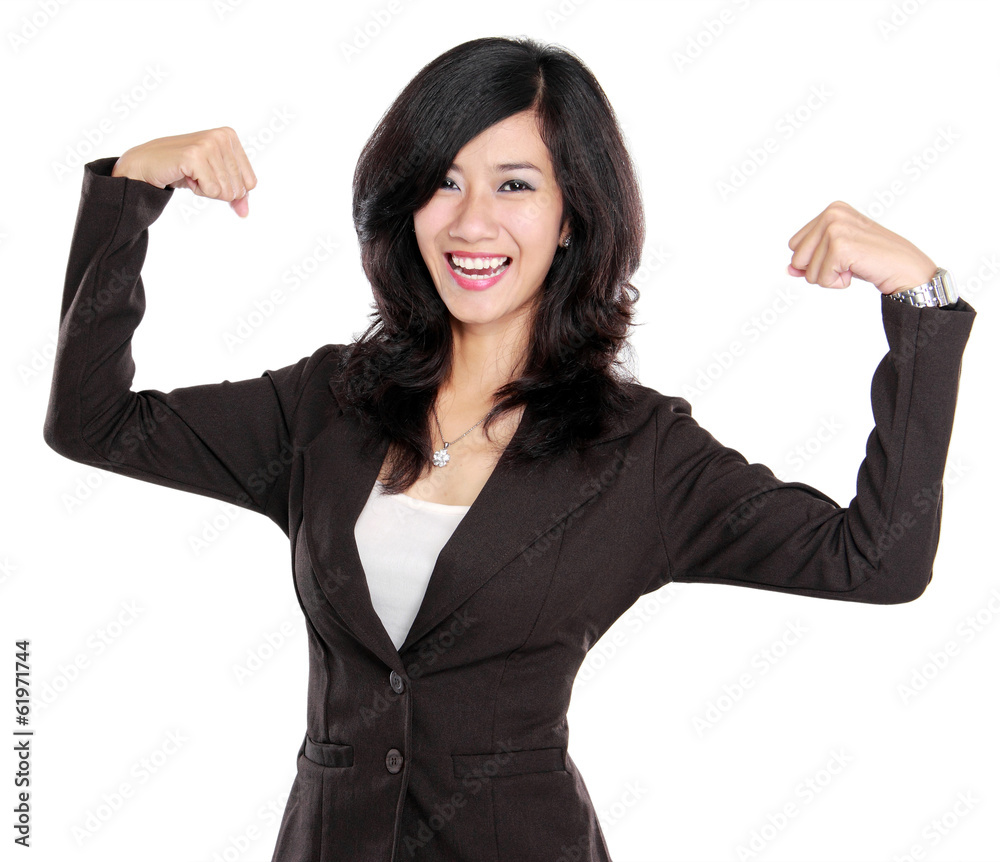 Excited businesswoman raised her hands showing strong concept Excited businesswoman raised her hands showing strong concept