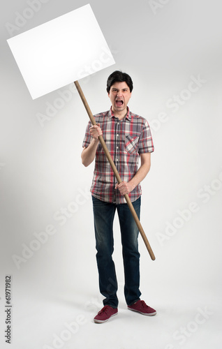 Bild auf Leinwand Protesting man with placard