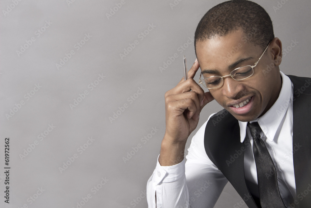 Young Black Man business thinking intensely Young Black Man business thinking intensely