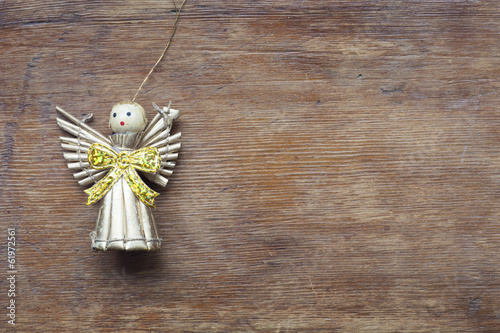 toy angel on wood
