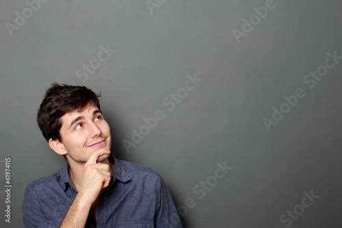 man looking up to copy space