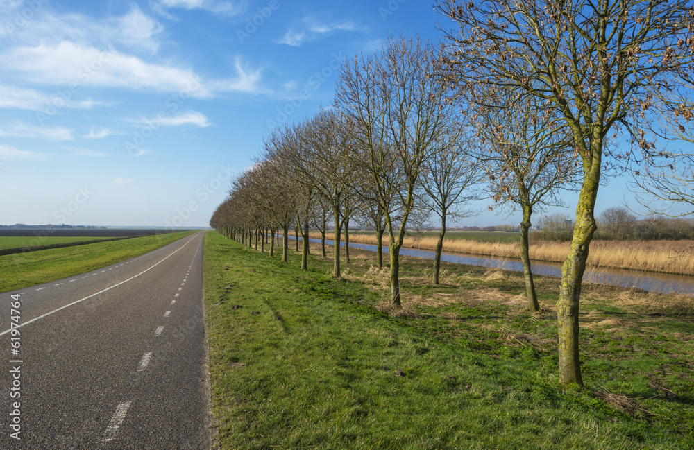 Road through the countryside in winter Road through the countryside in winter