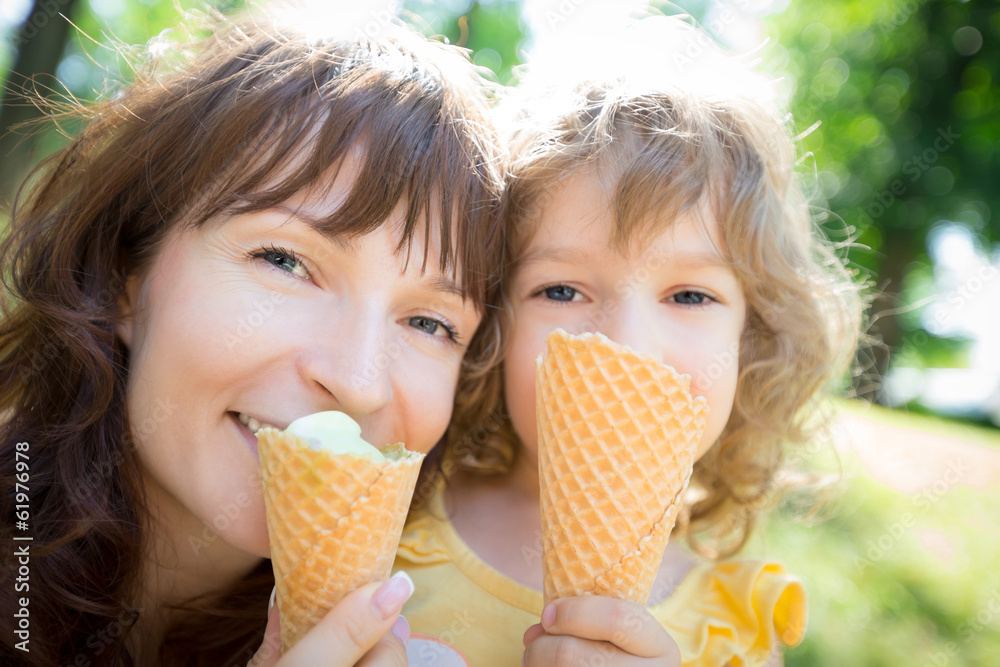 Happy child and mother eating ice cream Happy child and mother eating ice cream
