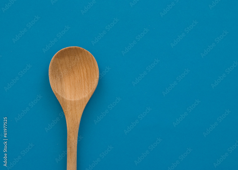 Holzlöffel mit buntem Hintergrund Holzlöffel mit buntem Hintergrund