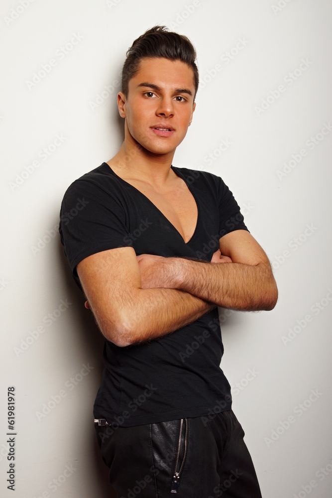 Portrait of young smiling man at black shirt Portrait of young smiling man at black shirt