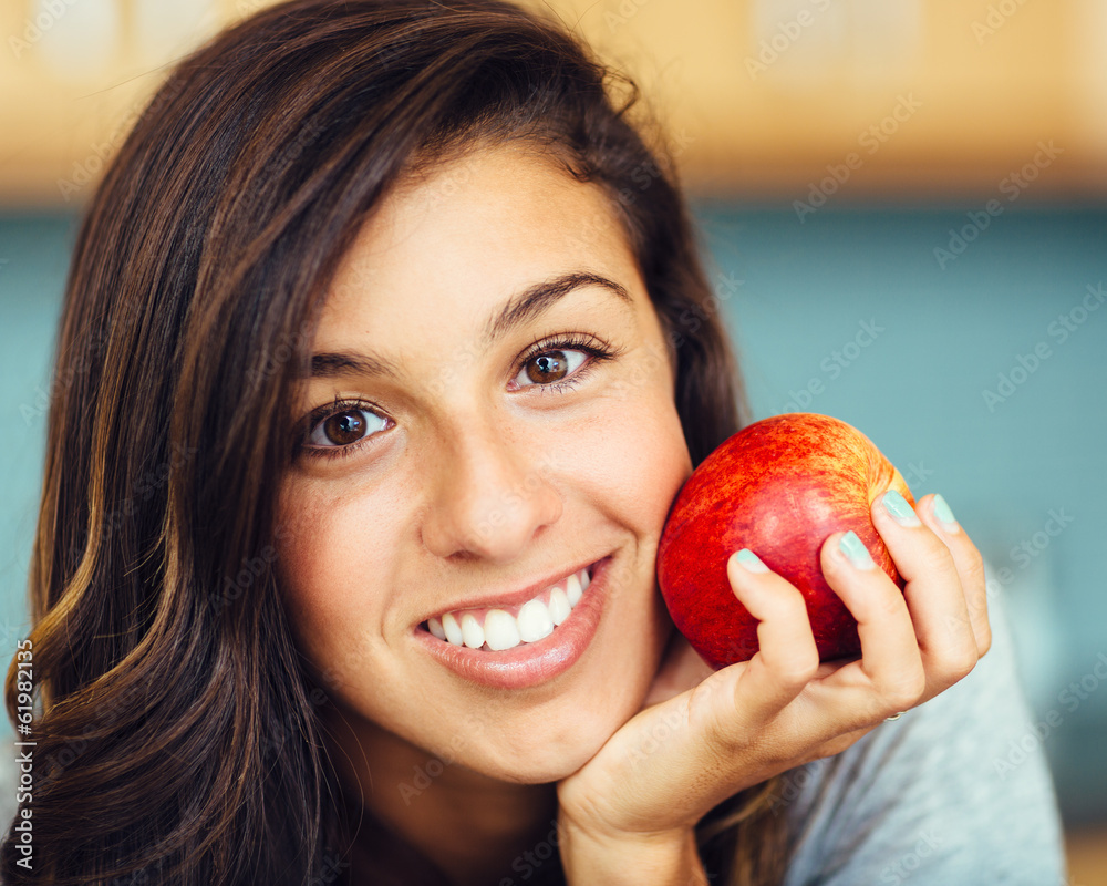 Portrait of attractive woman with an apple Portrait of attractive woman with an apple