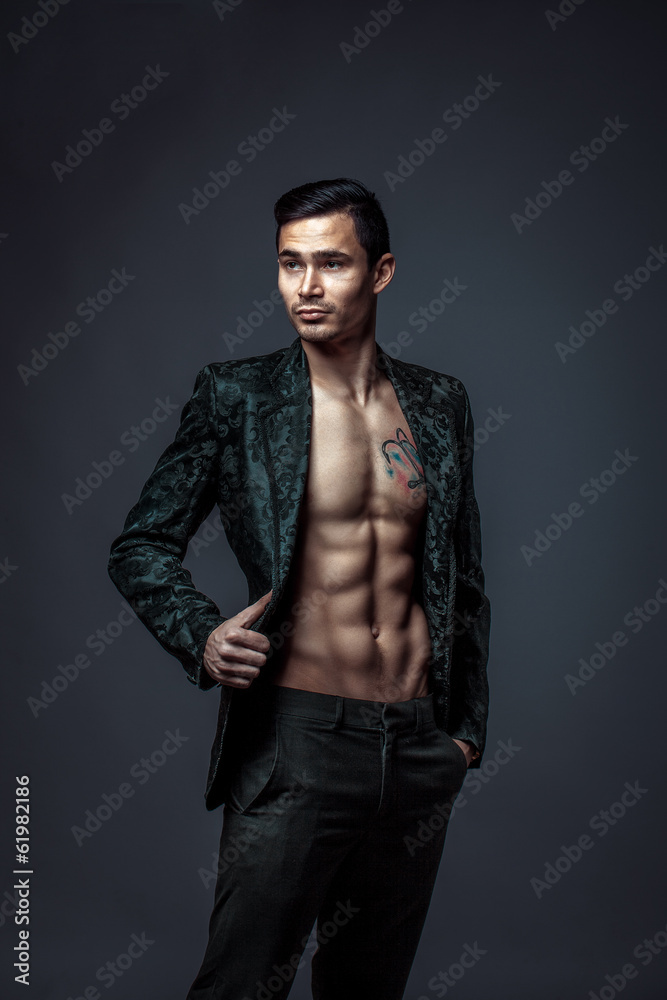 a young man in a jacket on the bare torso needs a young man in a jacket on the bare torso needs