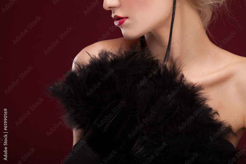 elegant Beautiful blonde lady with black feather fan. elegant Beautiful blonde lady with black feather fan.