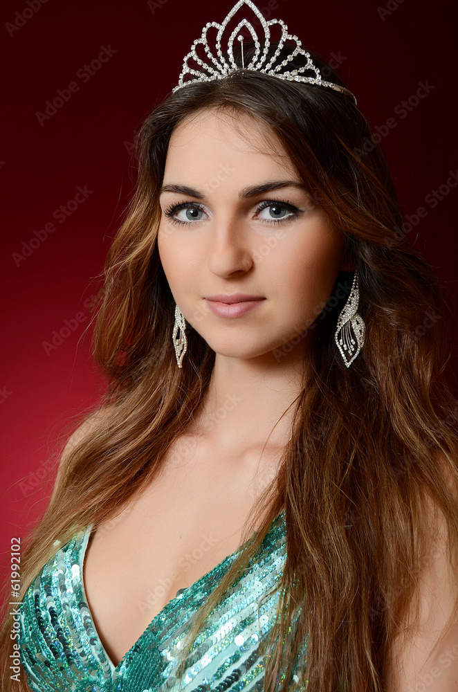 The beautiful woman with a tiara on a head The beautiful woman with a tiara on a head