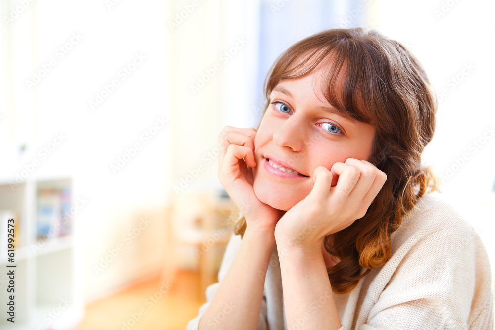Portrait of a young attractive woman relaxing on sofa Portrait of a young attractive woman relaxing on sofa