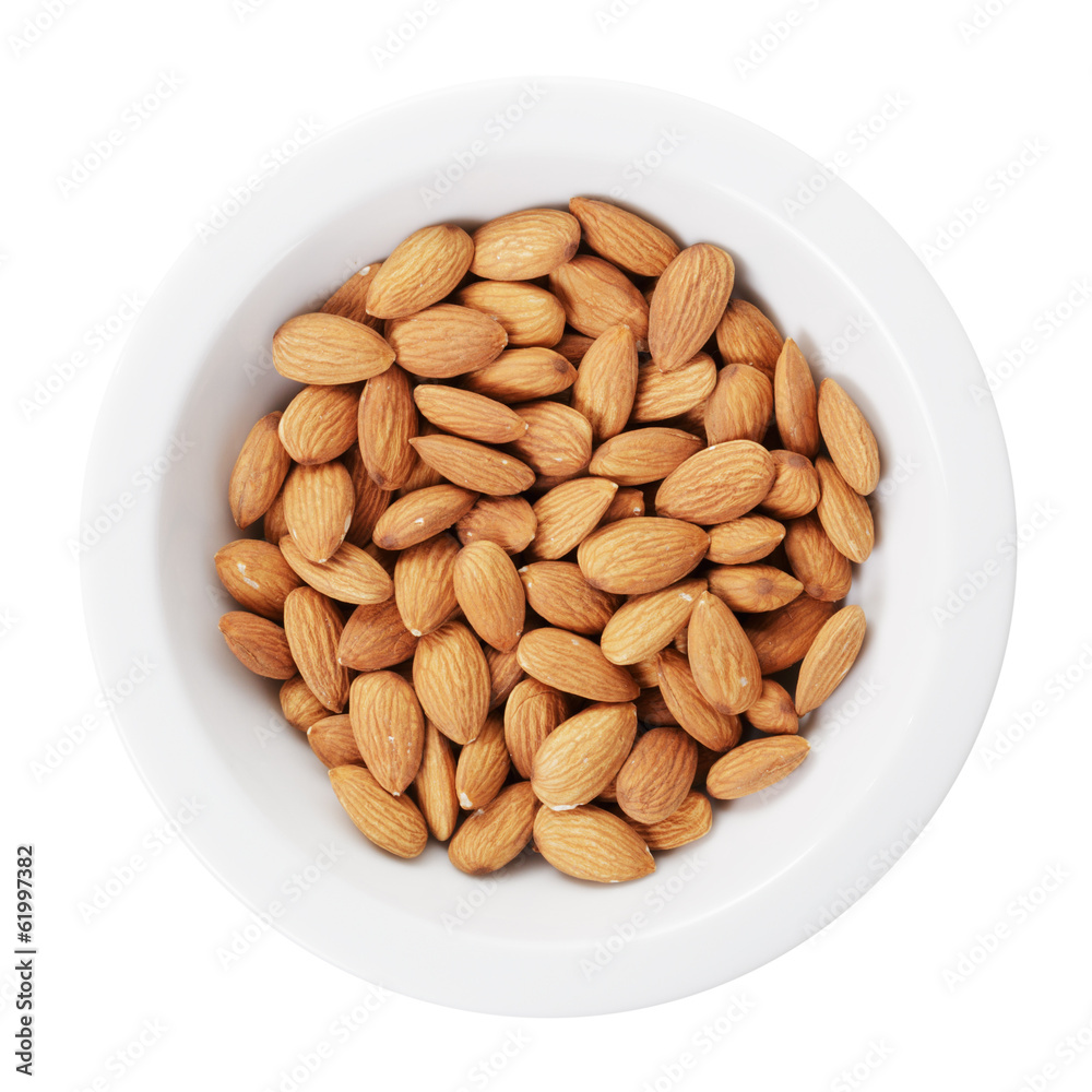 heap of almond nuts in bowl heap of almond nuts in bowl