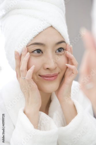 woman taking care of her skin