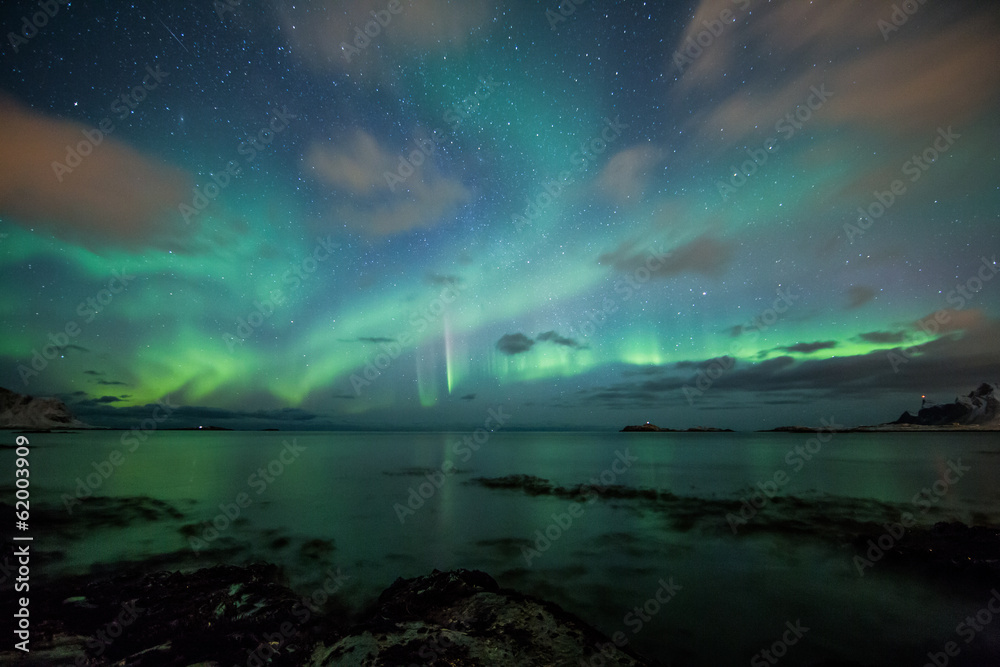 Northern lights above a beach in Norway