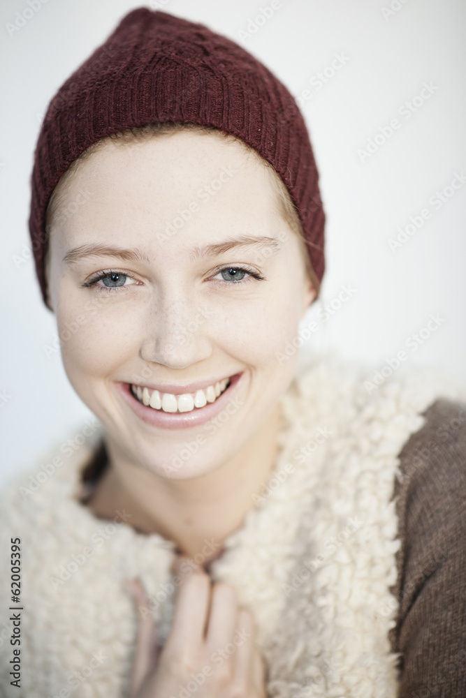 portrait of a beautiful young natural woman with a cap portrait of a beautiful young natural woman with a cap