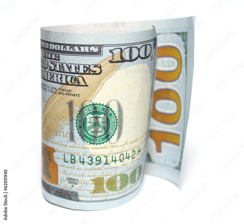 One hundred new dollars closeup on white background One hundred new dollars closeup on white background