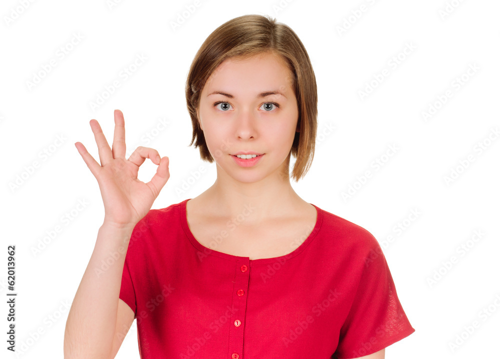 young woman shows sign and symbol on white background young woman shows sign and symbol on white background