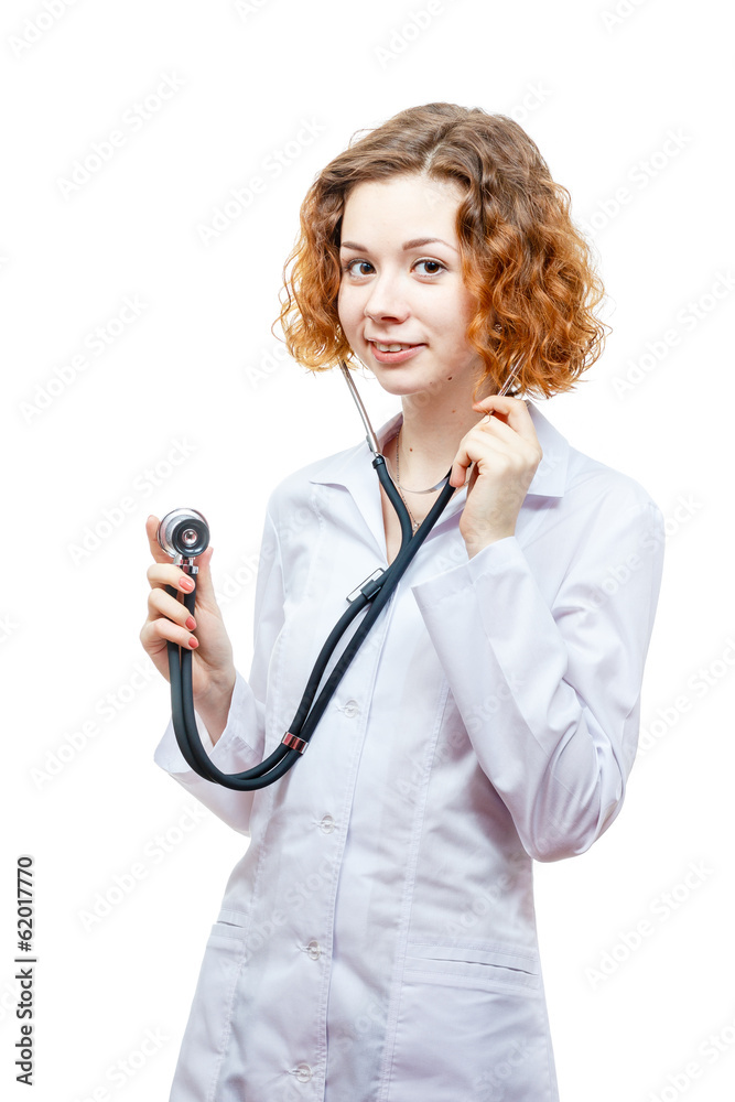 cute redhead doctor in lab coat with stethoscope cute redhead doctor in lab coat with stethoscope