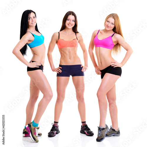 Three Graces - fitness girls, portrait of sport young women with