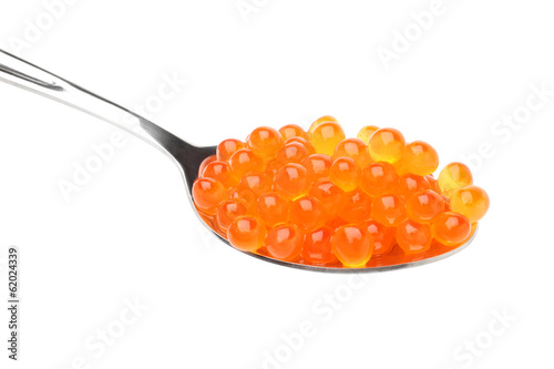 Red salted caviar in spoon