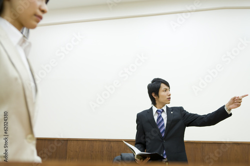 prosecutor expressing his opinion to judge