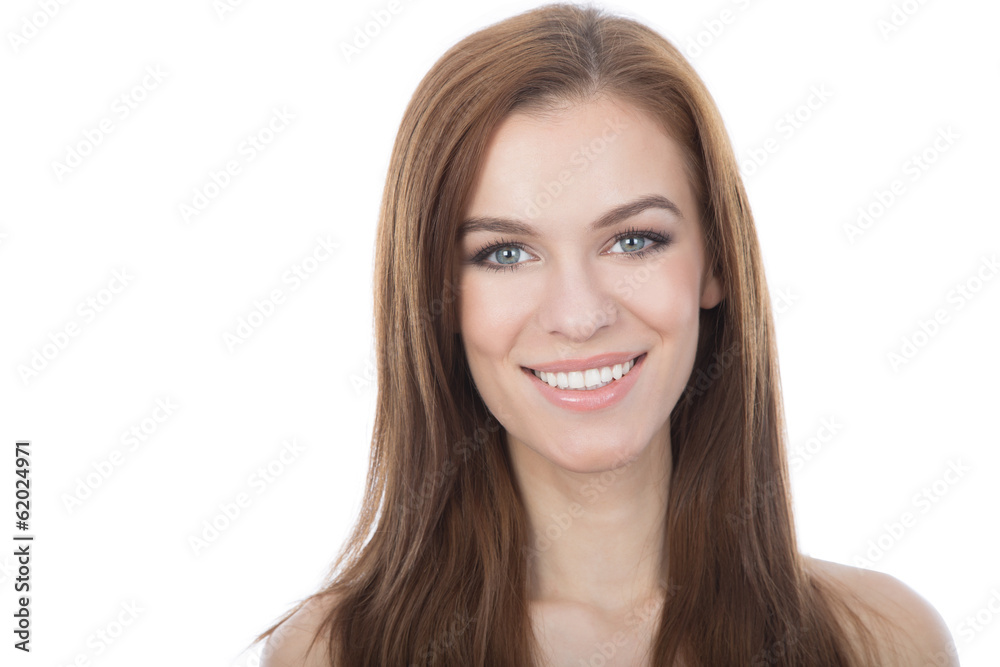 Head and shoulders studio portrait of a smiling woman. Isolated. Head and shoulders studio portrait of a smiling woman. Isolated.