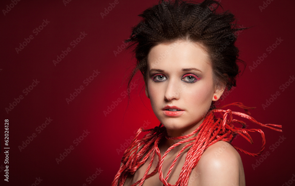 Fototapeta premium Beautiful young woman with black hair