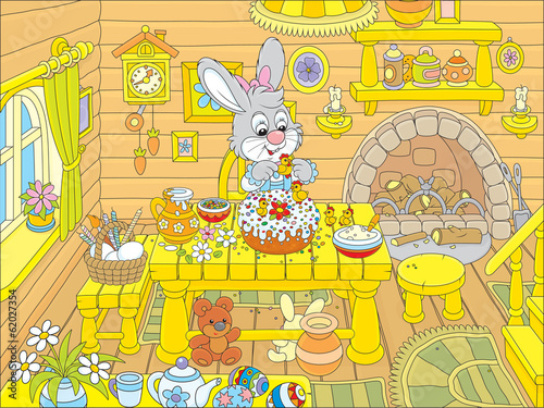 Easter bunny cooks a holiday cake