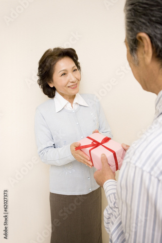 husband and wife receiving gift