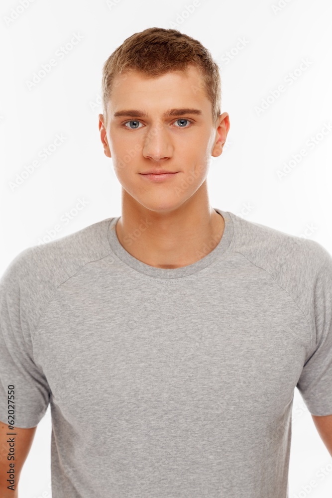 Handsome young man in grey t-shirt Handsome young man in grey t-shirt