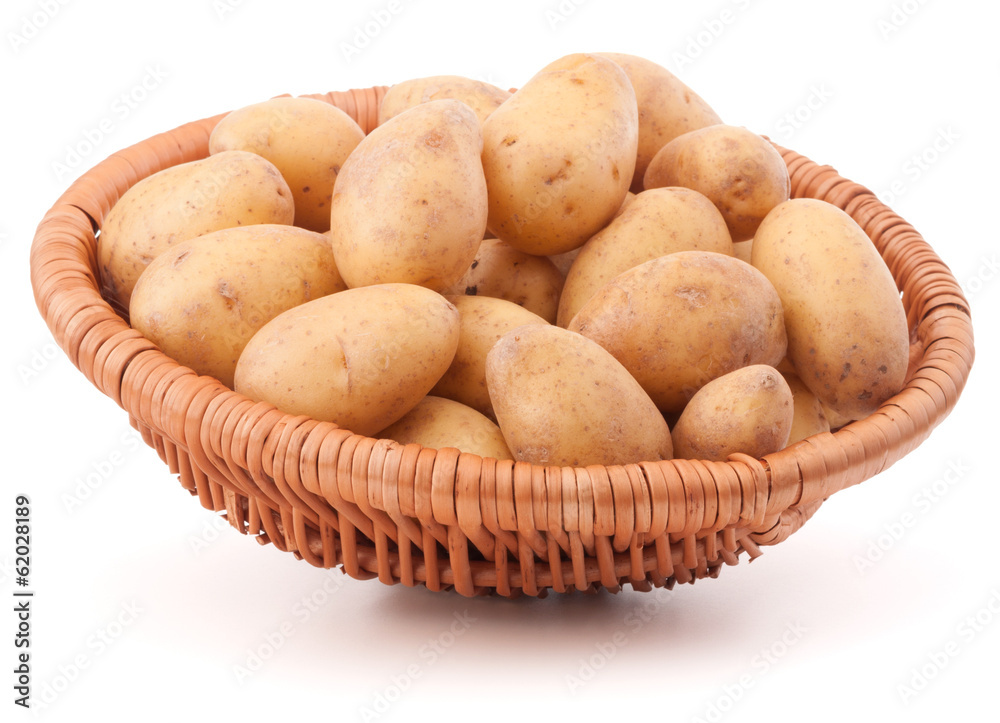 Potato tuber in wicker basket isolated on white background Potato tuber in wicker basket isolated on white background